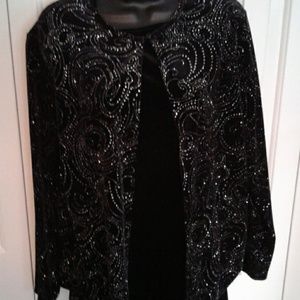 A two piece shirt jacket and pants